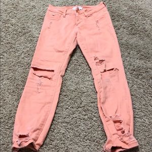 Distressed colored jeans